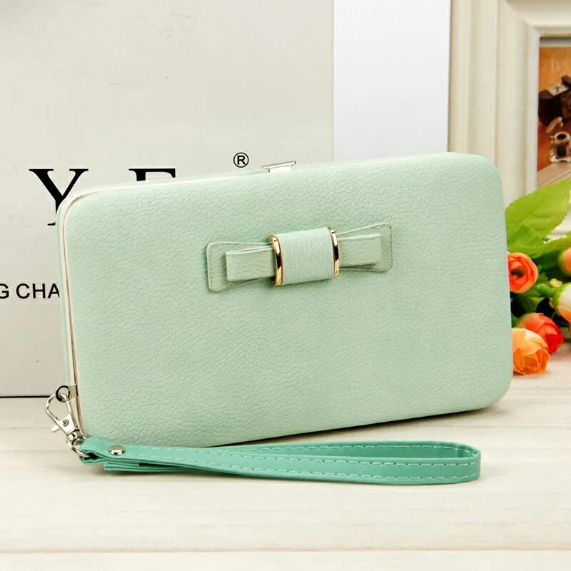 Factory spot low price wholesale new version of women's wallet in the long money bag butterfly knot lunch box woman bag tide