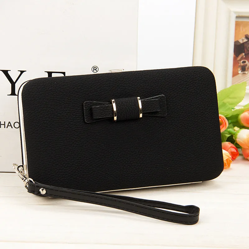 Factory spot low price wholesale new version of women's wallet in the long money bag butterfly knot lunch box woman bag tide