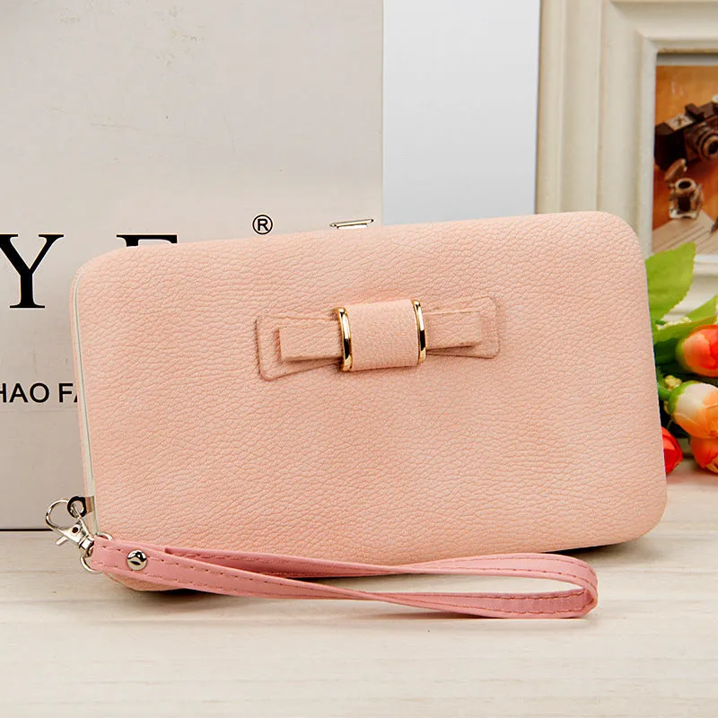 Factory spot low price wholesale new version of women's wallet in the long money bag butterfly knot lunch box woman bag tide