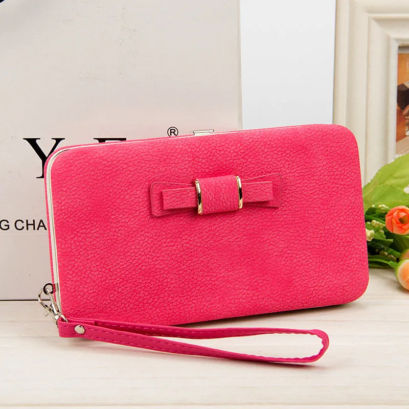 Factory spot low price wholesale new version of women's wallet in the long money bag butterfly knot lunch box woman bag tide