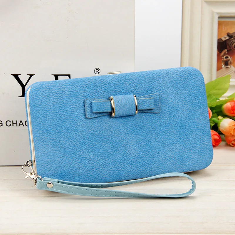 Factory spot low price wholesale new version of women's wallet in the long money bag butterfly knot lunch box woman bag tide